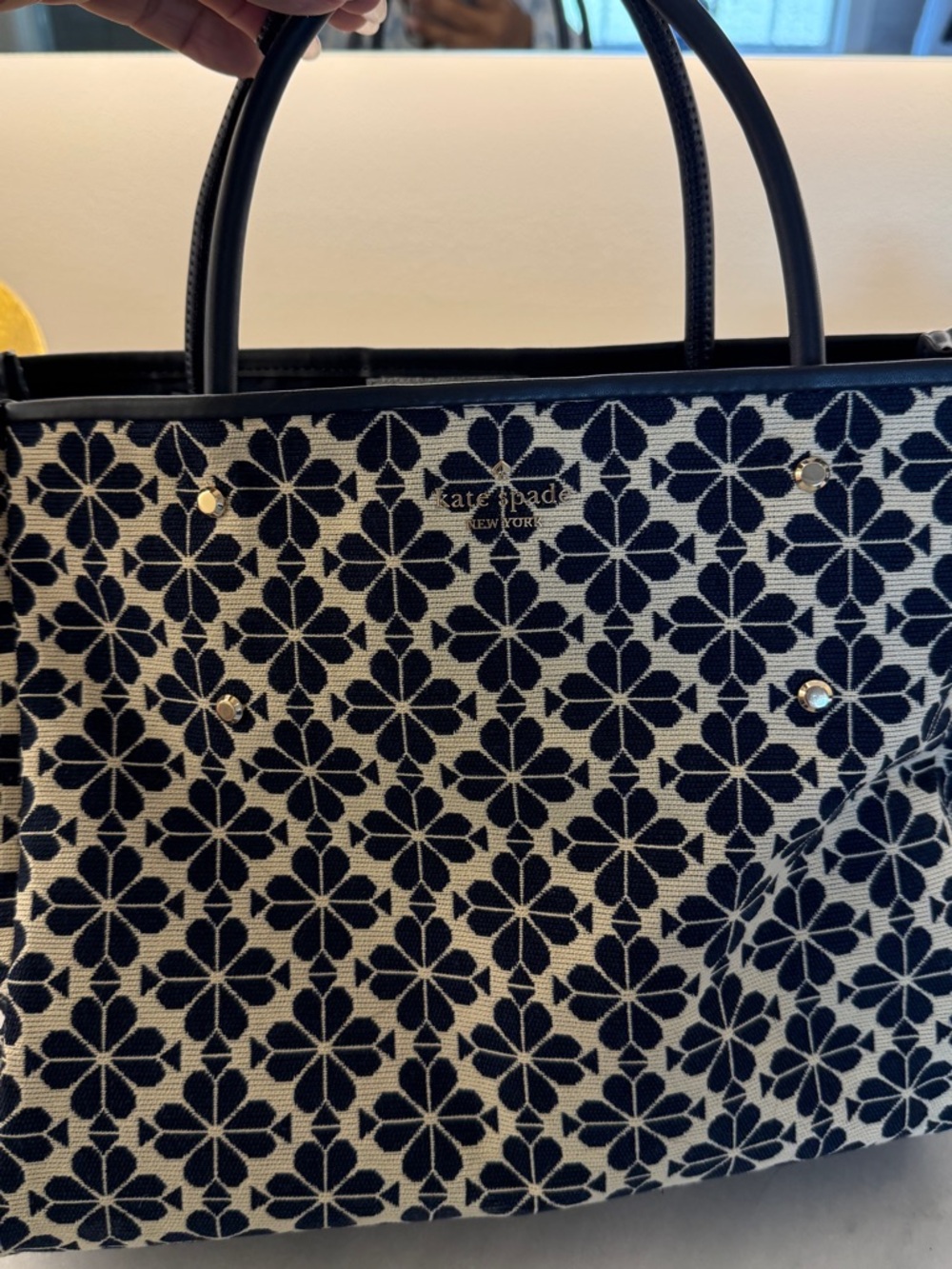 kate spade navy and cream floral jacquard tote with stud accents